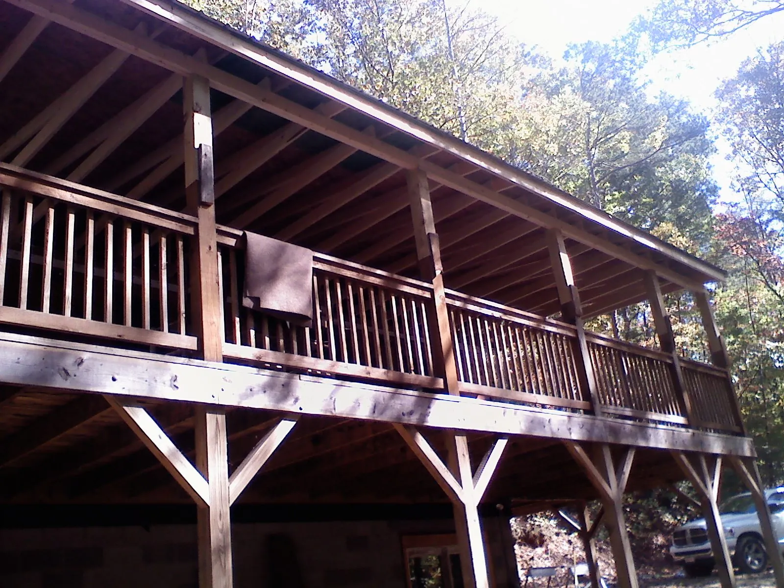 Timber framing under a new elevated porch and deck — Roof Leak Repair in Versailles by Roofing Brothers